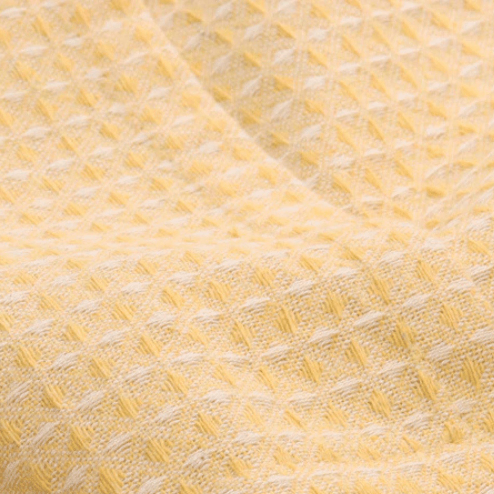 Butter yellow waffle texture dining tablecloth styled for contemporary home decor