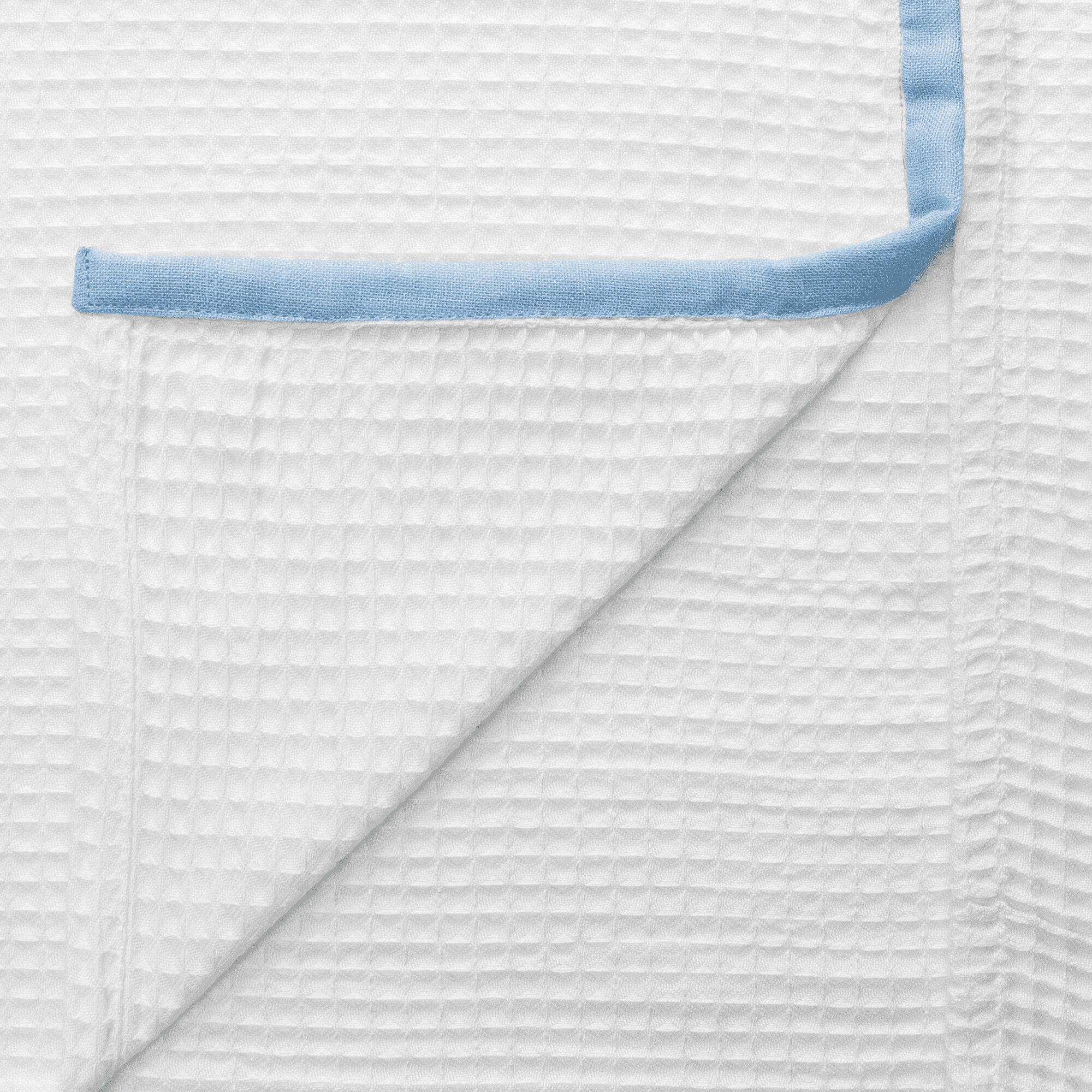 Luxury dusky blue bamboo bath towel with elegant waffle texture detailing