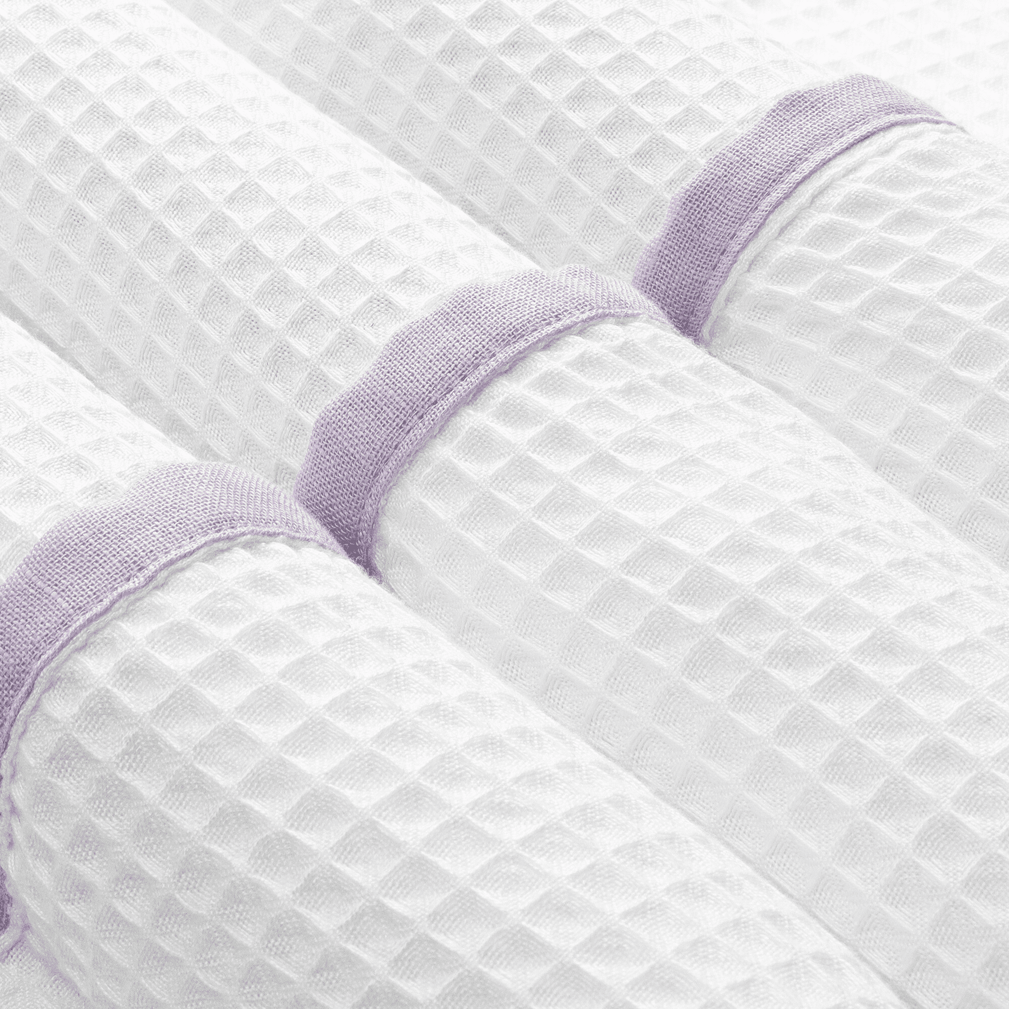 Luxury lavender bamboo bath towel with elegant waffle texture and linen detailing