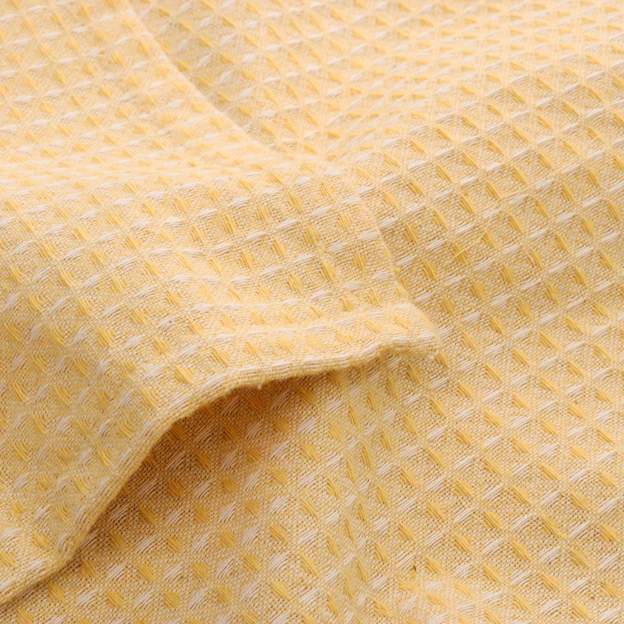 Minimal soft yellow waffle tablecloth for contemporary dining styling