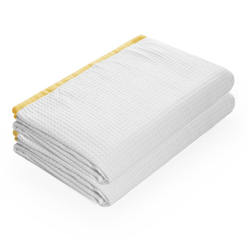 Yellow bamboo waffle bath towel with soft absorbent texture for modern bathrooms