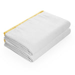 Yellow bamboo waffle bath towel with soft absorbent texture for modern bathrooms